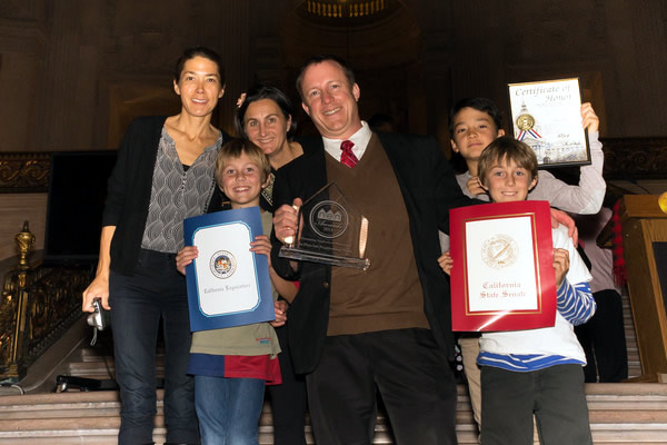 John Zwolinski of La Playa poses with family after receiving, on behalf of the the La Playa Neighborhood Watch, the best Neighborhood Watch Group Award.